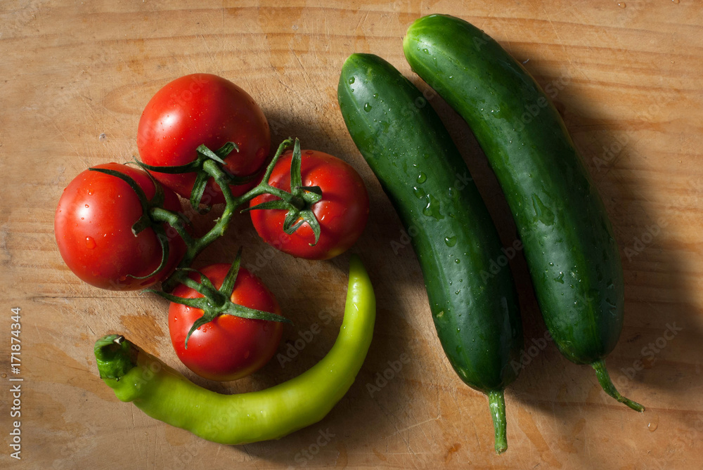 tomato cucumber pepper on desk tomato cucumber pepper on desk