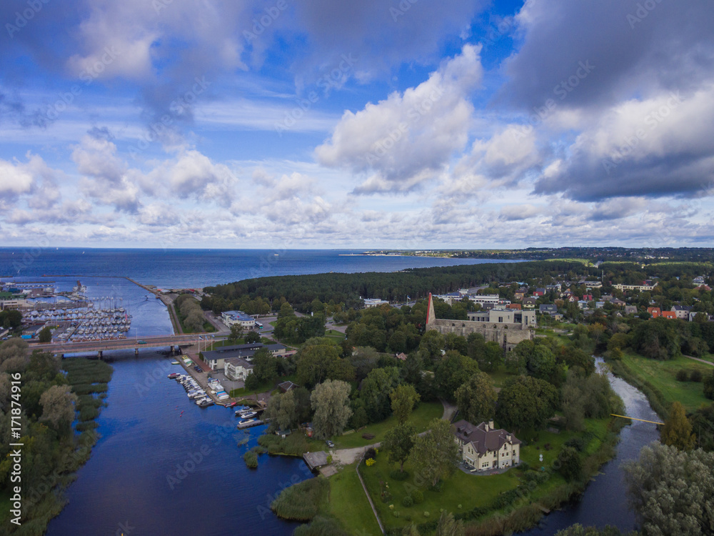 Fototapeta premium Aerial view river in the forest in Tallinn Estonia, district Pirita