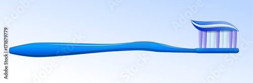 The blue toothbrush with toothpaste on the background