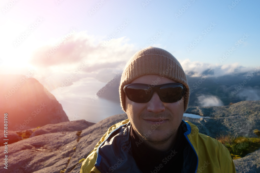 Traveler portrait on Lysefjorden fjord Traveler portrait on Lysefjorden fjord