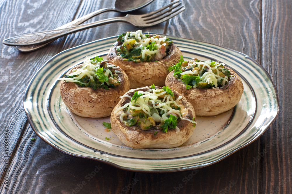 Mushrooms stuffed with vegetable mince and cheese