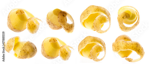 a fresh raw potatoes on a white background