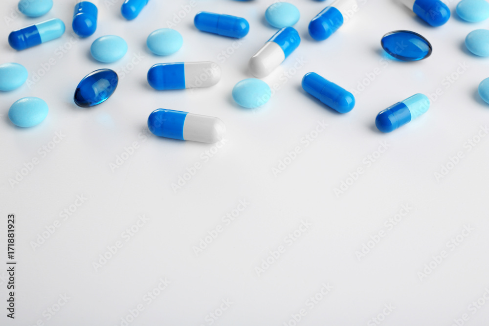 Blue pills on white background Blue pills on white background