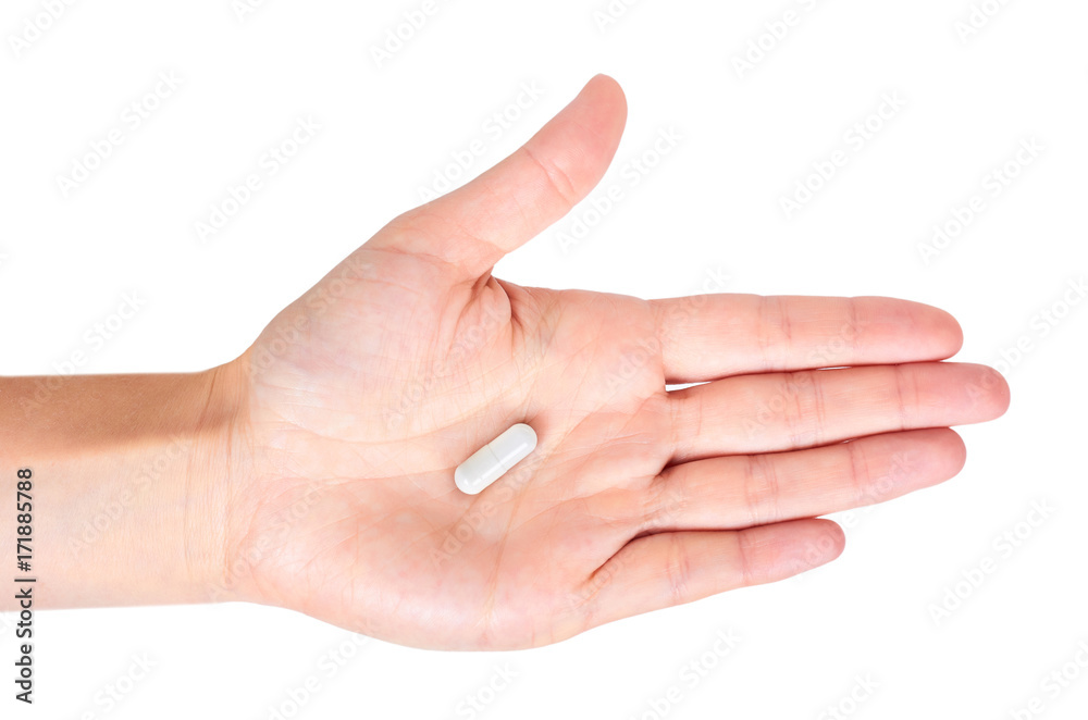 Capsules pills in hand isolated on white background Capsules pills in hand isolated on white background
