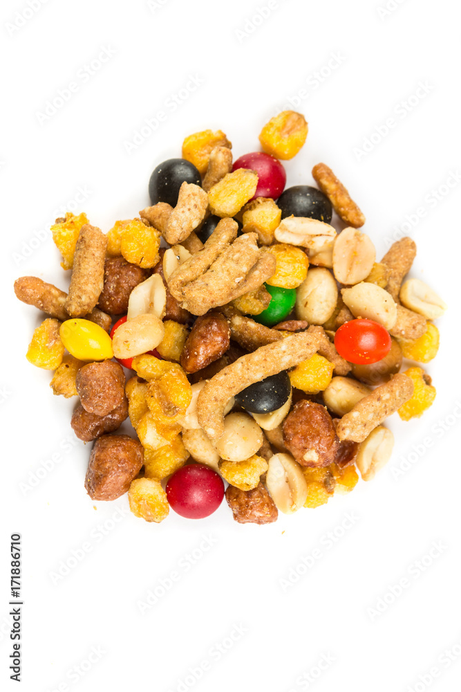 Pile of spiced crunch and candy mix isolated on a white background Pile of spiced crunch and candy mix isolated on a white background