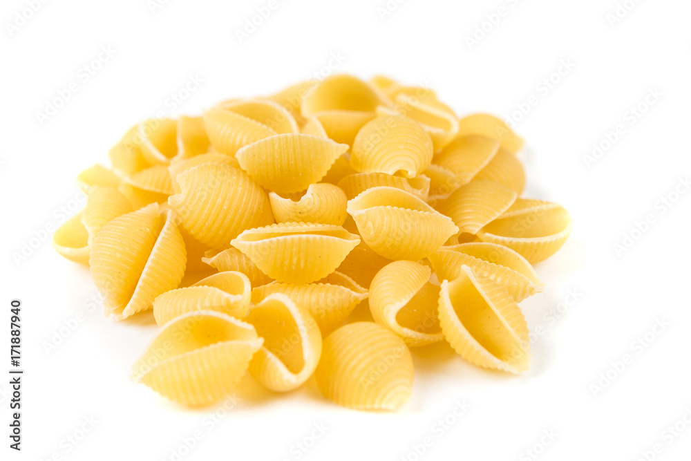 Pile of shell pasta isolated on a white background