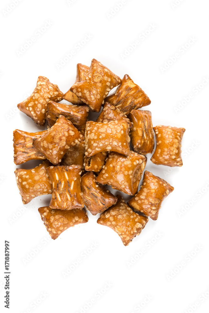 Pile of peanut butter filled pretzels isolated on a white background Pile of peanut butter filled pretzels isolated on a white background