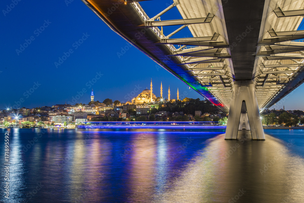 Long exposure aesthetic view of Halic Metro Bridge during the twilight