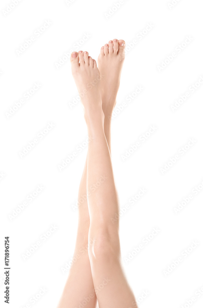 Beautiful female legs on white background Beautiful female legs on white background
