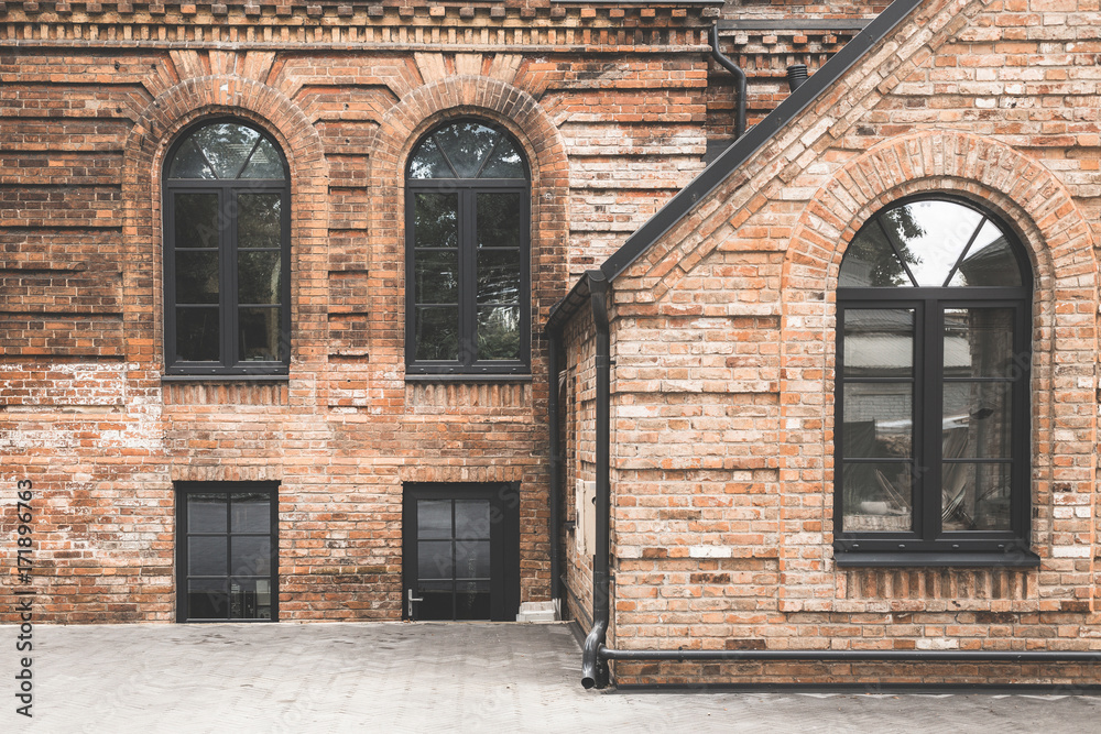 One storey red brick office building with multiple windows, Kaunas, Lithuania One storey red brick office building with multiple windows, Kaunas, Lithuania