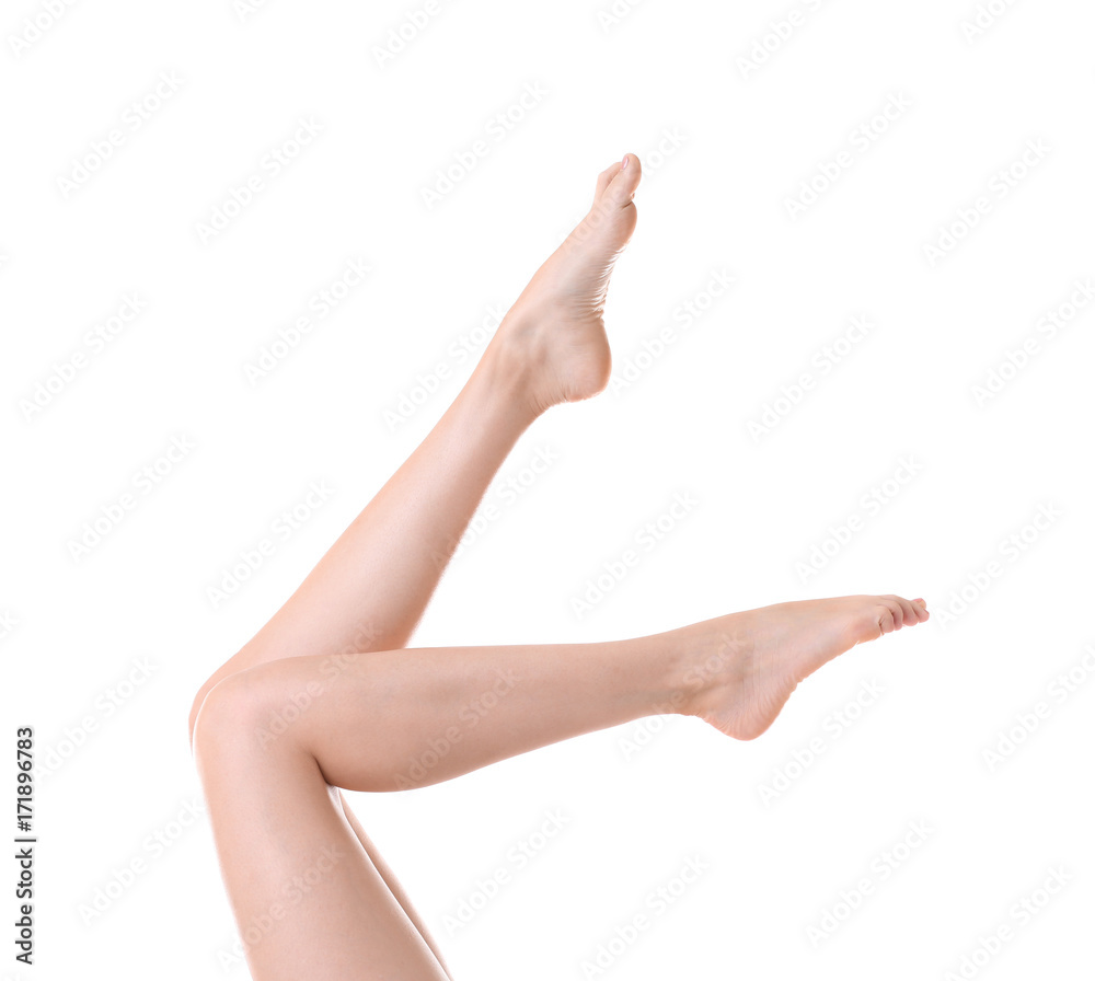 Beautiful female legs on white background Beautiful female legs on white background