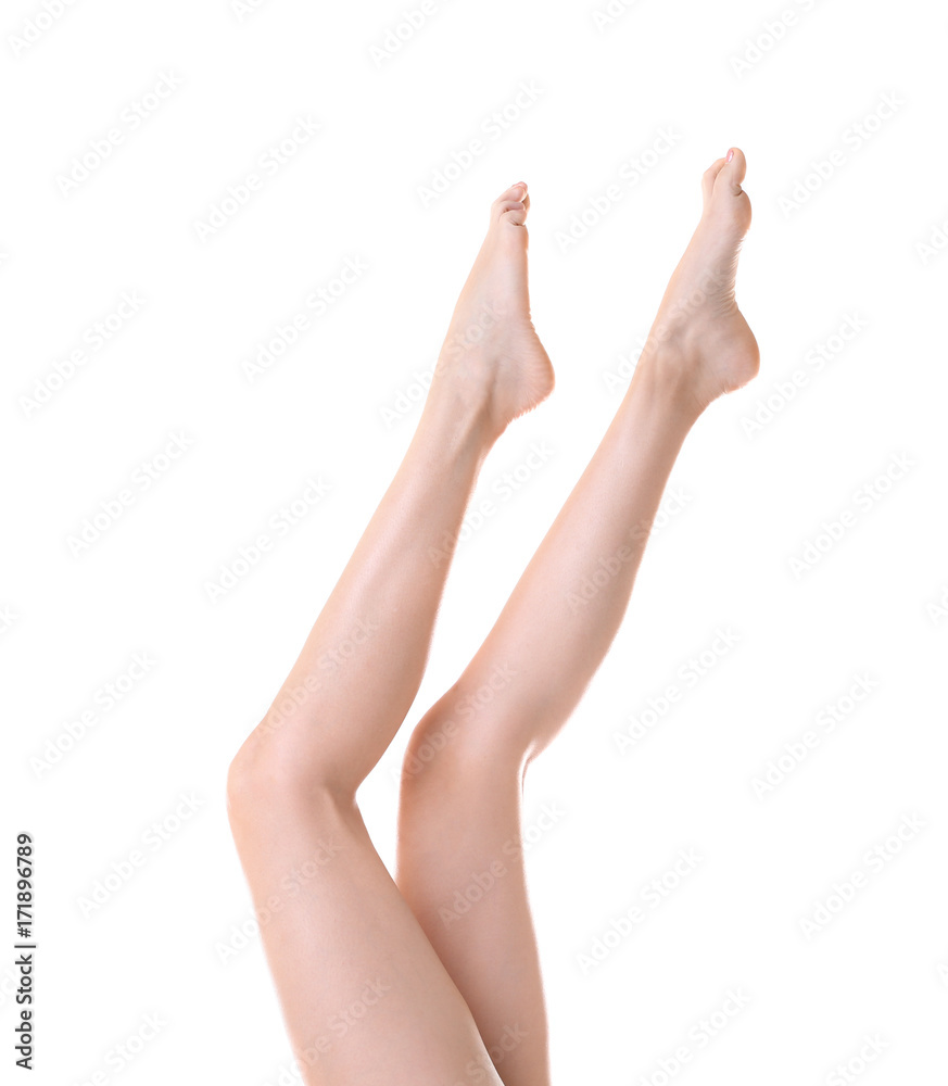 Beautiful female legs on white background Beautiful female legs on white background