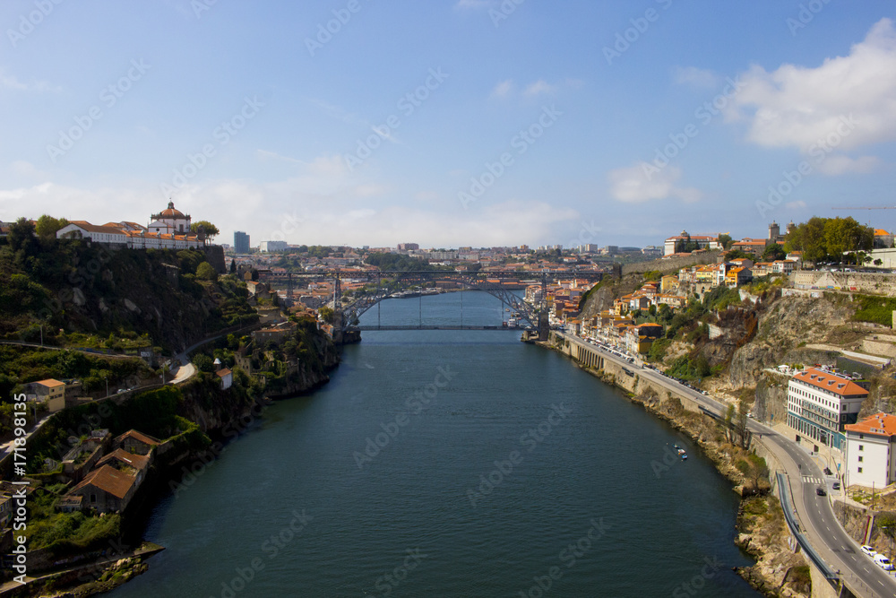 View of the landmark Luis Bridge in Porto, Portugal during the day