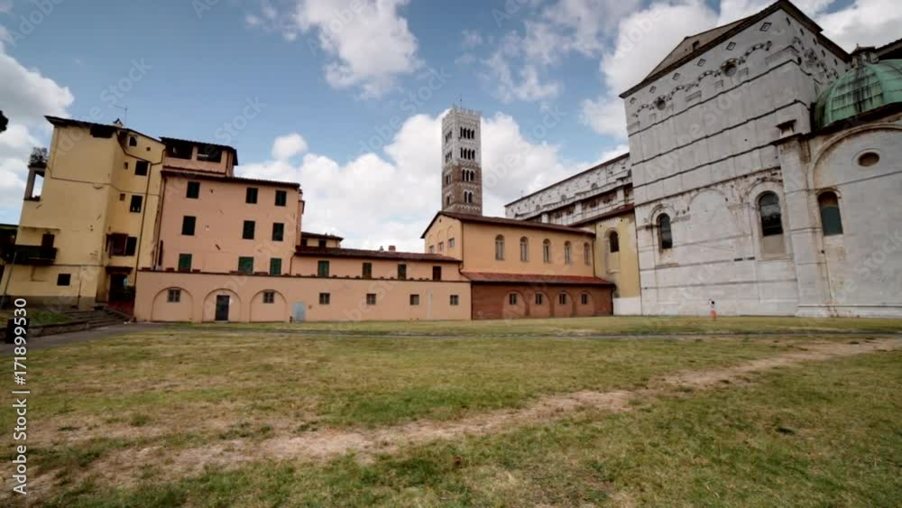 child taking photo of majestic church of Lucca, rare preserved wonder of medieval architecture in Italy child taking photo of majestic church of Lucca, rare preserved wonder of medieval architecture in Italy