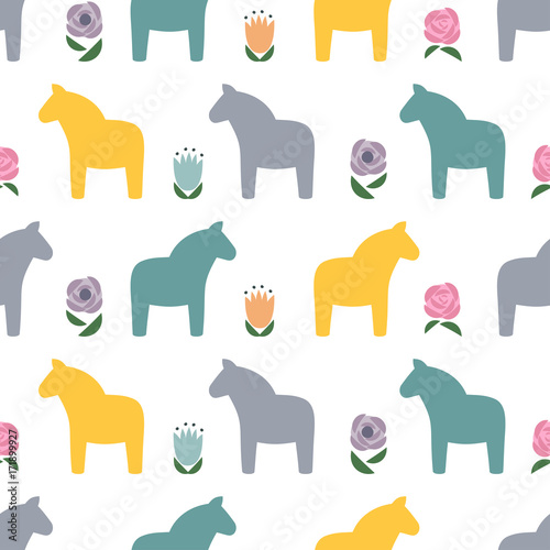 Scandinavian style pattern with traditional horses and flowers. Cute animal illustration card. Decorative seamless background. Design for textile  wallpaper  fabric  decor.