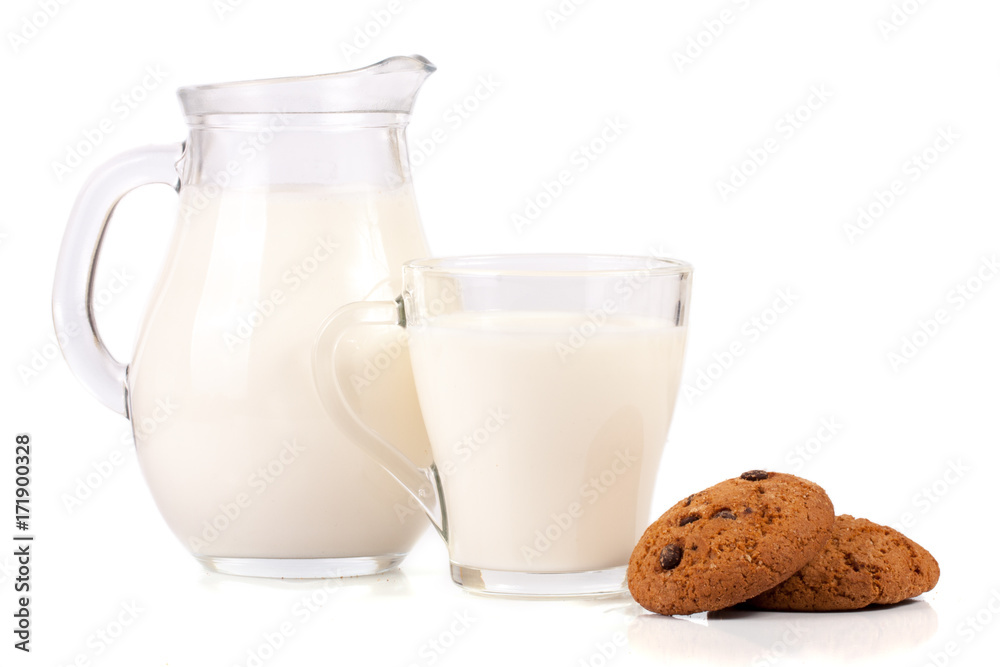 jug of milk with oatmeal cookies isolated on white background jug of milk with oatmeal cookies isolated on white background