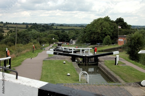Beautiful, old and traditional locks on a cloudy day at Foxton locks, Leicester, Leicestershire, England photo