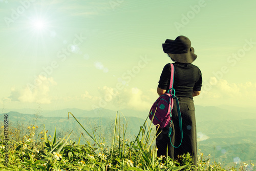 Tourist woman relaxing at mountain view landscape