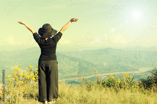 Tourist woman relaxing at mountain view landscape