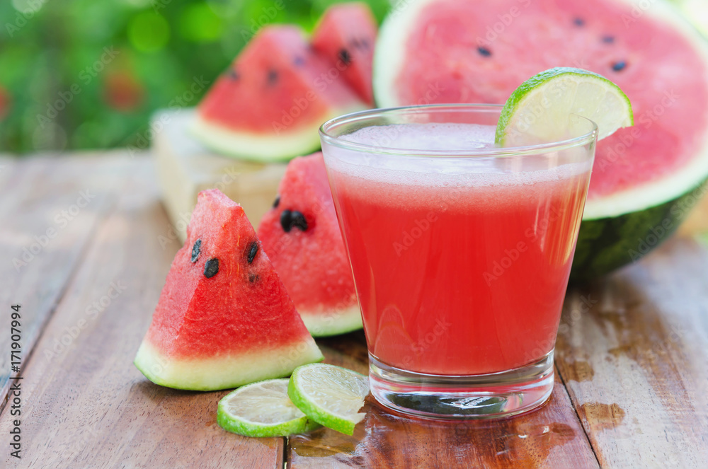 slice of watermelon for smoothies with lime on woods background slice of watermelon for smoothies with lime on woods background