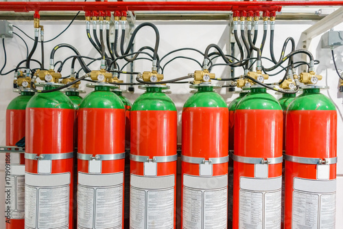 Hazard fire suppression system of a gas fire extinguishing. a closeup of the fire extinguishing system in an office building