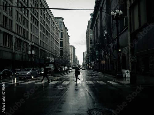 man walking in the rain 