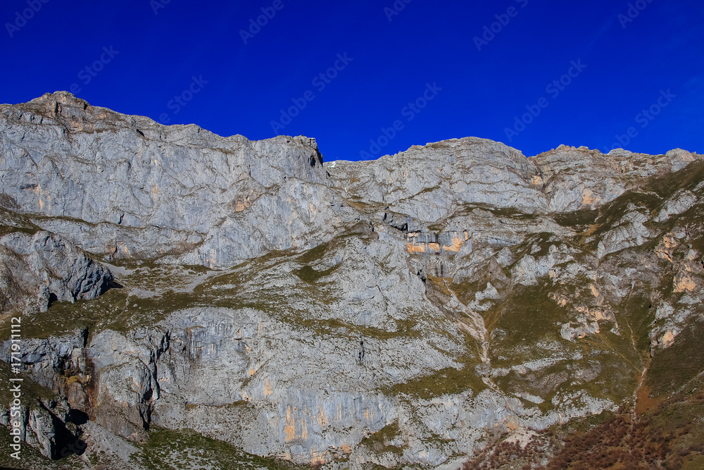 Winter Landscape in Picos de Europa mountains, Cantabria, Spain. The jagged, deeply fissured Picos de Europa mountains straddle southeast Asturias, southwest Cantabria and northern Castilla y Leon.