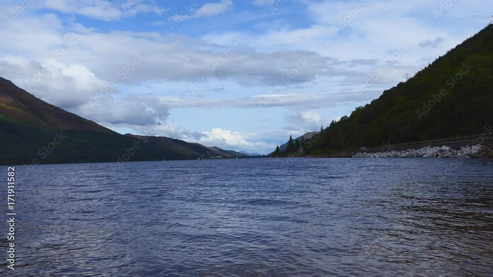 Clouds over a mountain lake. Clouds over a mountain lake.
