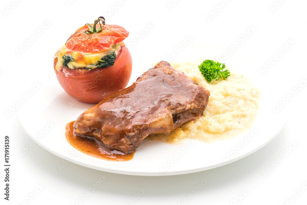 grilled rib pork with mash potatoes and spinach baked in tomato grilled rib pork with mash potatoes and spinach baked in tomato