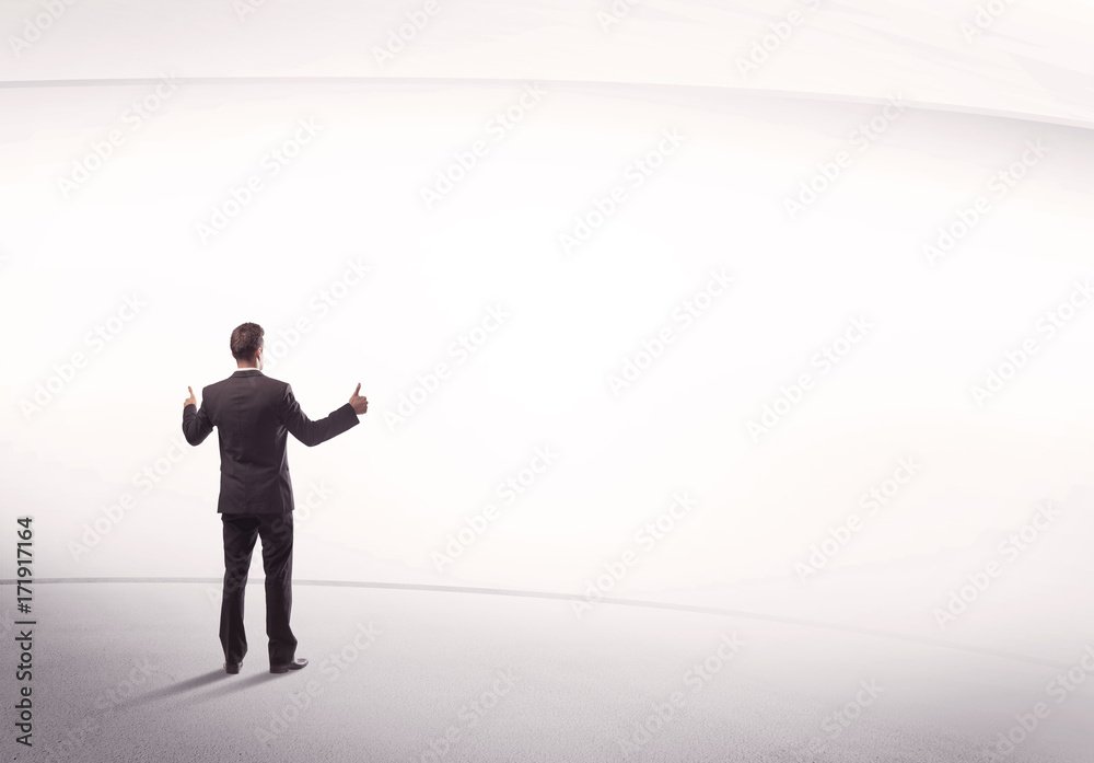 Businessman with briefcase standing still Businessman with briefcase standing still