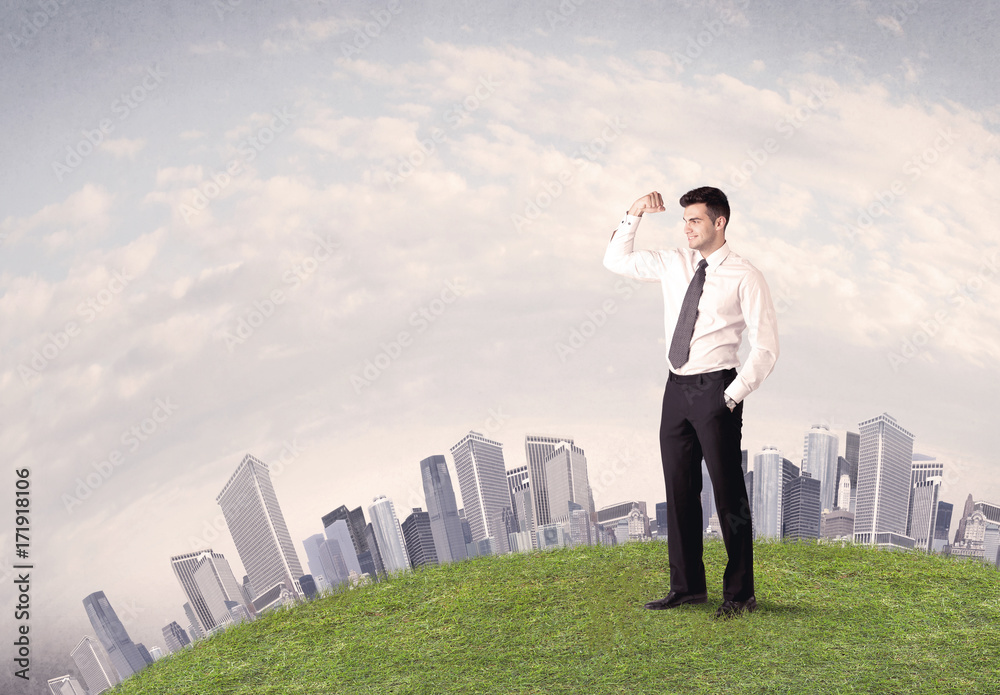 man standing in front of city landscape man standing in front of city landscape