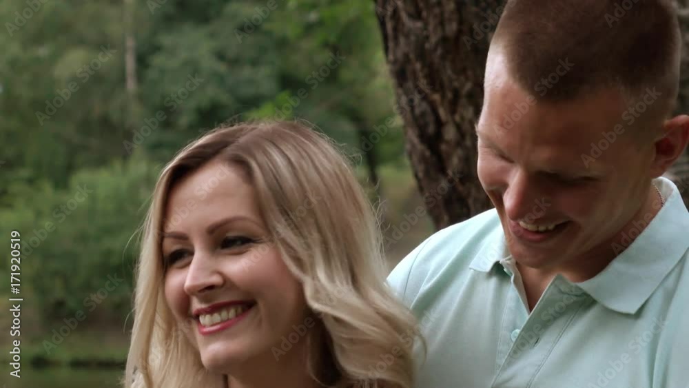 Happy Young Couple Expecting Baby. Beautiful Pregnant Woman and Her Husband Together Caressing Her Belly . Mom and Dad. Happy Young Couple Expecting Baby. Beautiful Pregnant Woman and Her Husband Together Caressing Her Belly . Mom and Dad.