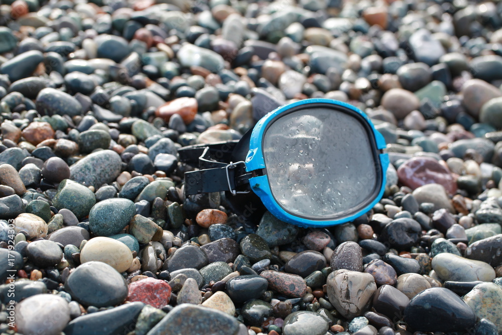 mask for scuba diving on a pebble beach mask for scuba diving on a pebble beach