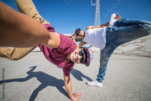 Fototapeta Naklejka Na Ścianę i Meble -  Breakdancers taking a selfie