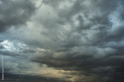 Dark sky with blak clouds brings storm rain