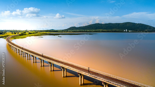 Aerial Photo Railway Curve Track to the mountains is located on the River Pasak River Dam,Lopburi Thailand