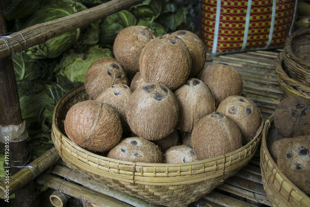 Coconuts on the market, close up view, Myanmar, Asia Coconuts on the market, close up view, Myanmar, Asia