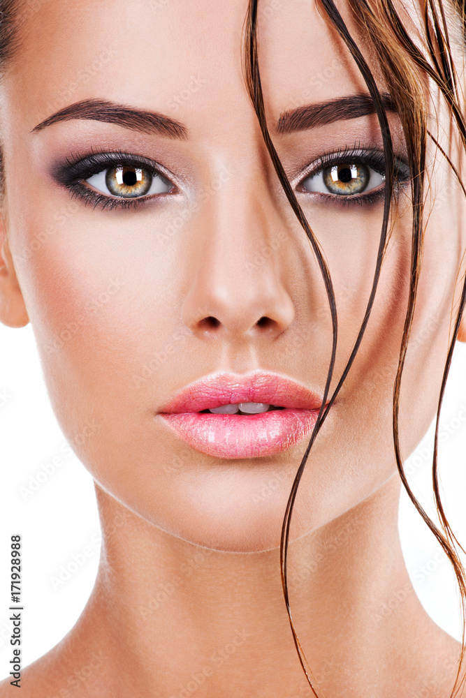 Beautiful face of a woman with dark brown eye makeup Beautiful face of a woman with dark brown eye makeup