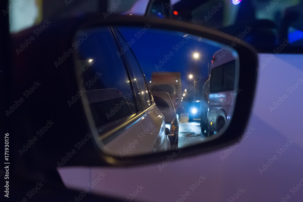 reflected in side mirror of car reflected in side mirror of car