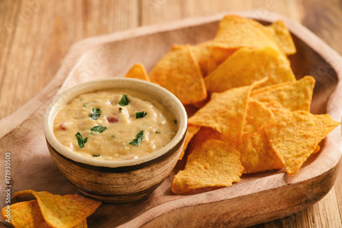 Mexican cheese dip served with nachos.