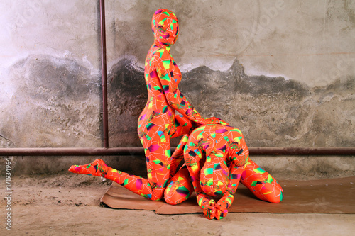 two orange zentai girls photo