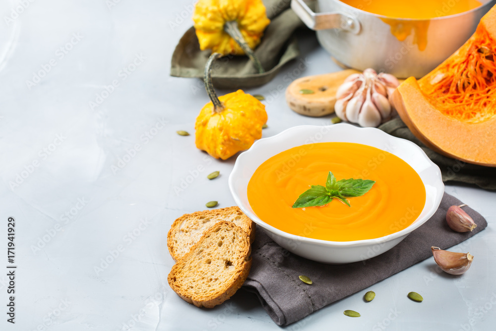 Fall autumn roasted orange pumpkin carrot soup with garlic Fall autumn roasted orange pumpkin carrot soup with garlic