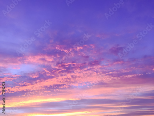 Beautiful  sun rays  of sunset with colorful of  sky background . © Umarin