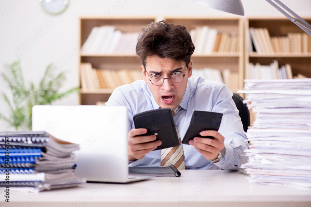 Funny accountant bookkeeper working in the office Funny accountant bookkeeper working in the office
