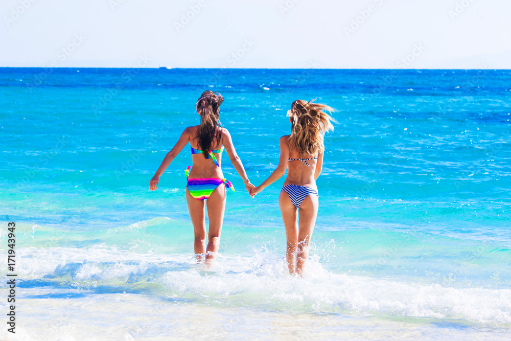 Girls running to sea Girls running to sea