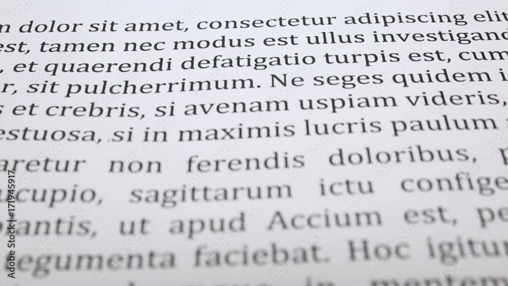News paper rolling up the screen and into focus with a shallow depth of field and lorem ipsum wording News paper rolling up the screen and into focus with a shallow depth of field and lorem ipsum wording