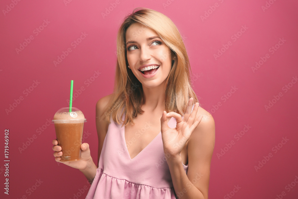 Beautiful young woman with fresh smoothie on color background Beautiful young woman with fresh smoothie on color background