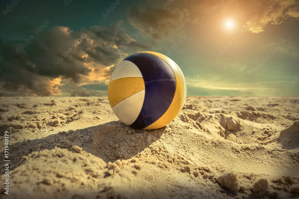 Beach Volleyball. Game ball under sunlight and blue sky.