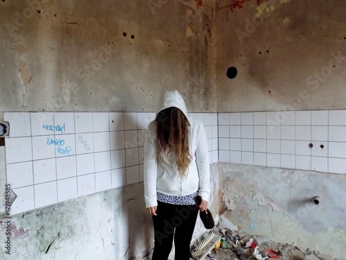 Young alcohollic women with alcohol bottle, alcohol addiction