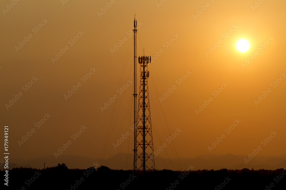 Fototapeta premium Silhouetted Antennas in the sunset